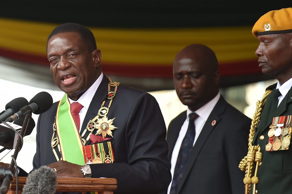 

Zimbabwe's new interim President Emmerson Mnangagwa gives an address after his swearing-in ceremony in Harare on Friday, marking the final chapter of a political drama that toppled his predecessor Robert Mugabe after a military takeover. (Tony Karumba/AFP/Getty Images) 