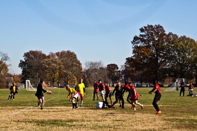 The Rogue Samurai Men battle the Hazbro Blazers at the Apple Pie 7s Rugby Tournament in Fairmount Park. (Kimberly Paynter/WHYY)