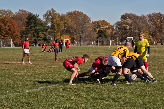 The Rogue Samurai Men battle the Hazbro Blazers at the Apple Pie 7s Rugby Tournament in Fairmount Park. (Kimberly Paynter/WHYY)