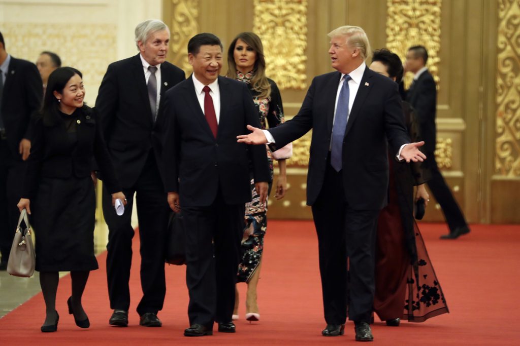 Donald Trump,Xi Jinping U.S. President Donald Trump and Chinese President Xi Jinping arrive for a state dinner at the Great Hall of the People