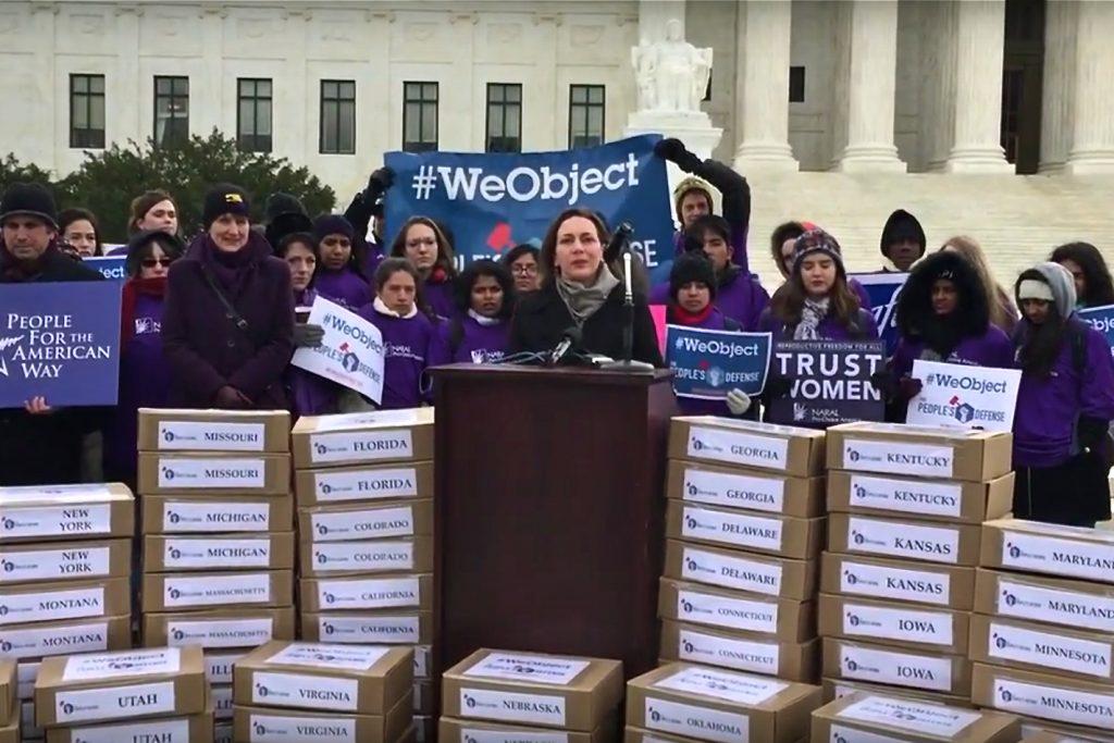 Tiffany Muller of End Citizens United speaks at a rally in Wasington, D.C., in March.