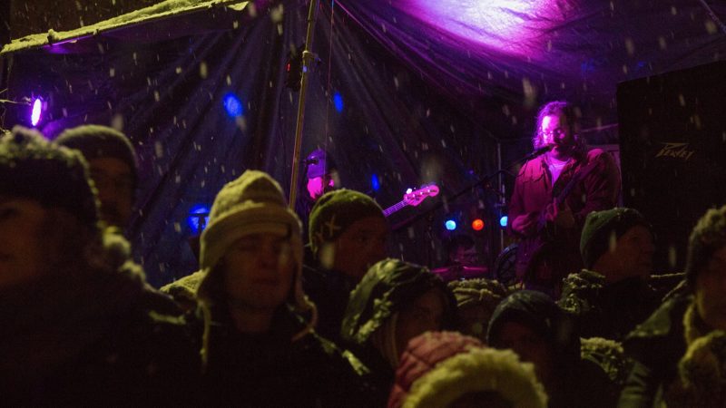 The Assorted Lunatics perform as the crowds gather for the lighting of the phoenix at the 14th Annual Firebird Festival in Phoenixville. (Emily Cohen for WHYY)