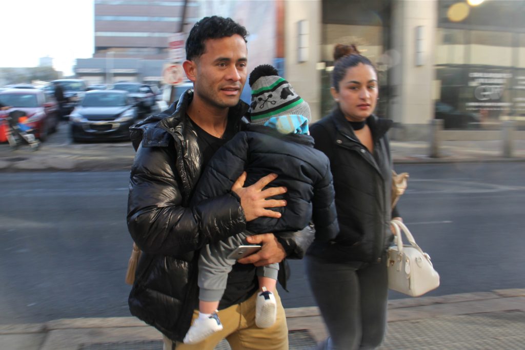 2017 12 18-e lee-osman enriquez-philadelphia ice office-daca application lost in mail Osman Enriquez arrives at immigration enforcement offices in Philadelphia with his fiancee, Cindy, and year-old son, Jayden. Enriquez was threatened with deportation after his DACA application was lost in the mail.