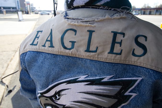 The twenty-five year old jacket worn by Greg Buchanan serves as his lucky charm as he sets up to tailgate with friends and family ahead of the Raiders vs. Eagles Christmas Day game, at the Lincoln Financial Field, on Monday.