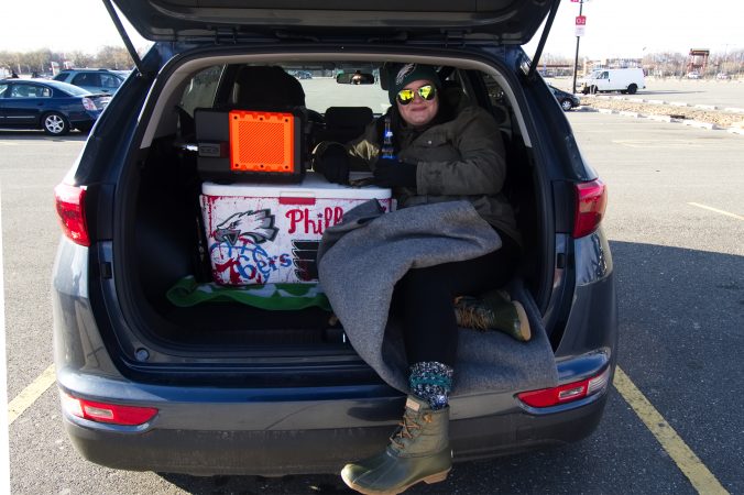 Fans set up to tailgate ahead of the Raiders vs. Eagles Christmas Day game, at the Lincoln Financial Field, on Monday. (Bastiaan Slabbers for WHYY)