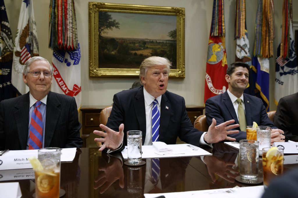 Donald Trump, Paul Ryan, Mitch McConnell FILE - In this March 1, 2017, file photo President Donald Trump, flanked by Senate Majority Leader Mitch McConnell of Ky., left, and House Speaker Paul Ryan of Wis., speaks in the Roosevelt Room of the White House in Washington.