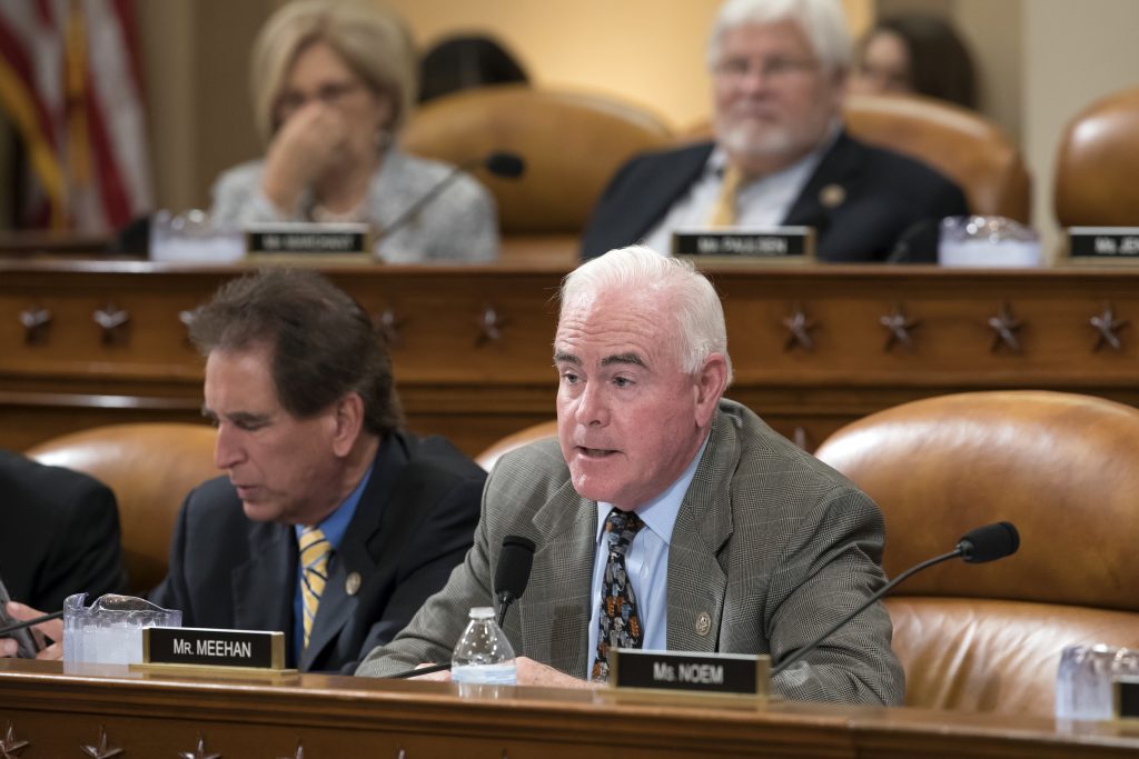 Jim Renacci, Pat Meehan Rep. Pat Meehan, R-Pa., with Rep. Jim Renacci, R-Ohio, left, work on the markup of the GOP's far-reaching tax overhaul, on Capitol Hill in Washington, Monday, Nov. 6, 2017.