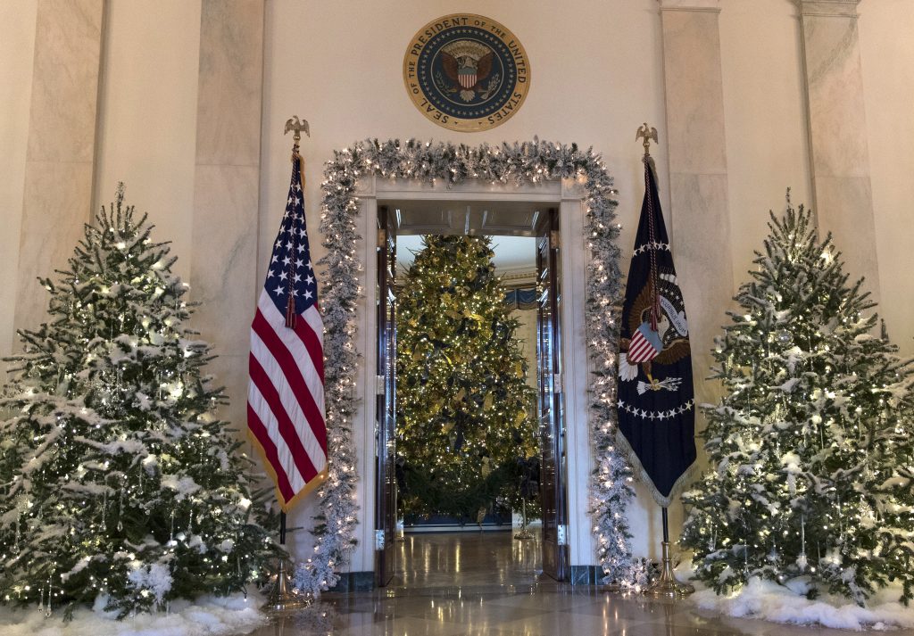 The official White House Christmas tree, center, is seen in the Blue Room during a media preview of the 2017 holiday decorations at the White House in Washington, Monday, Nov. 27, 2017. (AP Photo/Carolyn Kaster)