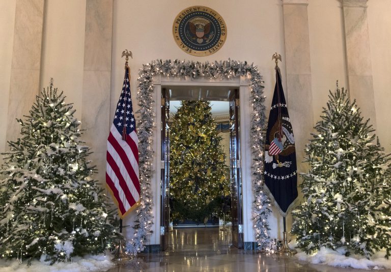 The official White House Christmas tree, center, is seen in the Blue Room during a media preview of the 2017 holiday decorations at the White House in Washington, Monday, Nov. 27, 2017. (AP Photo/Carolyn Kaster)