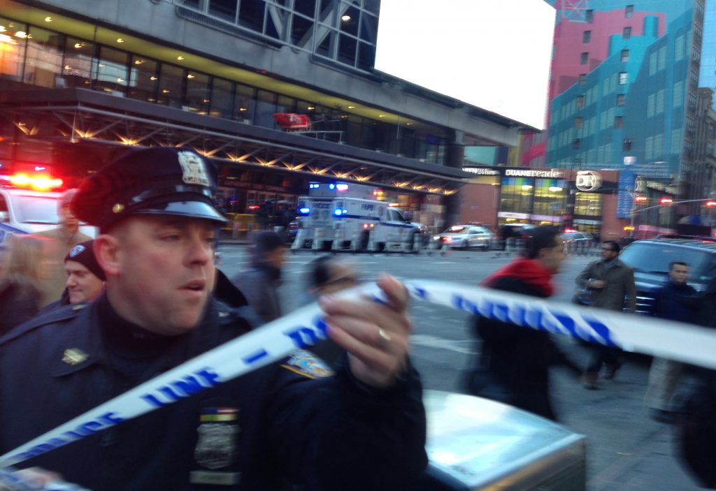 Manhattan Explosion Report Police respond to a report of an explosion near Times Square on Monday, Dec. 11, 2017, in New York.