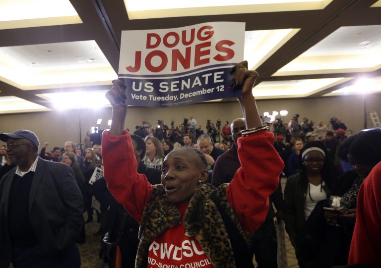 A supporter of Democratic candidate for U.S. Senate Doug Jones what for results during an election-night watch party Tuesday, Dec. 12, 2017, in Birmingham , Ala. Jones defeated Republican Roy Moore.