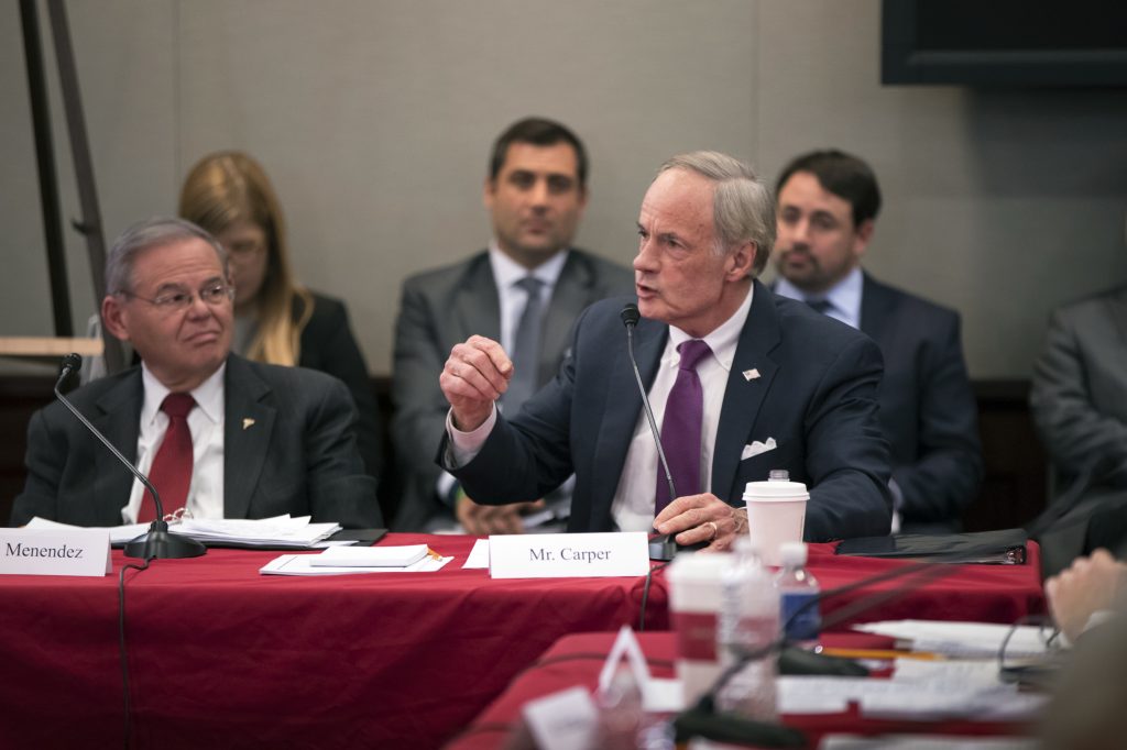 Bob Menendez, Tom Carper Sen. Tom Carper, D-Del., joined at left by Sen. Bob Menendez, D-N.J., objects strongly to the procedures as tax bill conferees gather to work on the sweeping GOP plan, on Capitol Hill in Washington, Wednesday, Dec. 13, 2017. (AP Photo/J. Scott Applewhite)