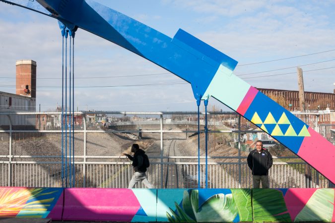 A new mural was recently completed on the B Street Bridge in Kensington. (Brad Larrison for WHYY)