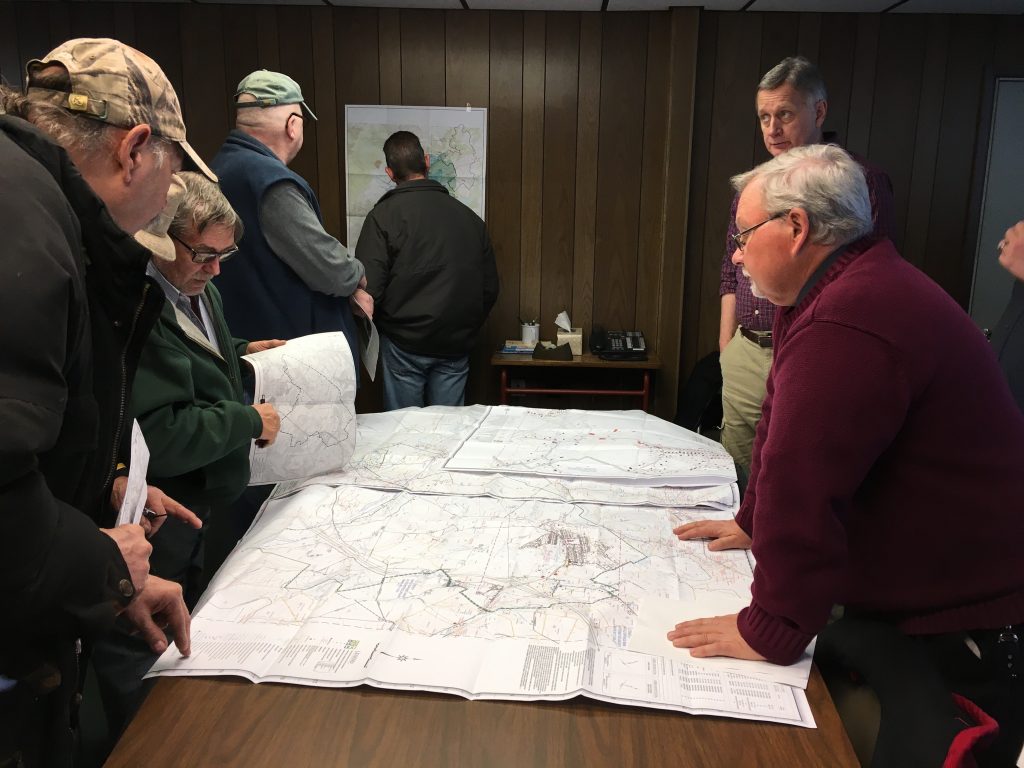 IMG_4234-e1513133134739 Somerset County residents examine a map of the proposed Keyser mine Tuesday at a meeting with officials from the Department of Environmental Protection. (Amy Sisk/StateImpact Pennsylvania)