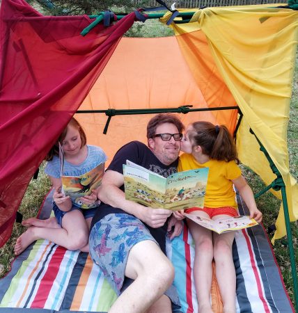 Author creating memorable moments with his daughters.