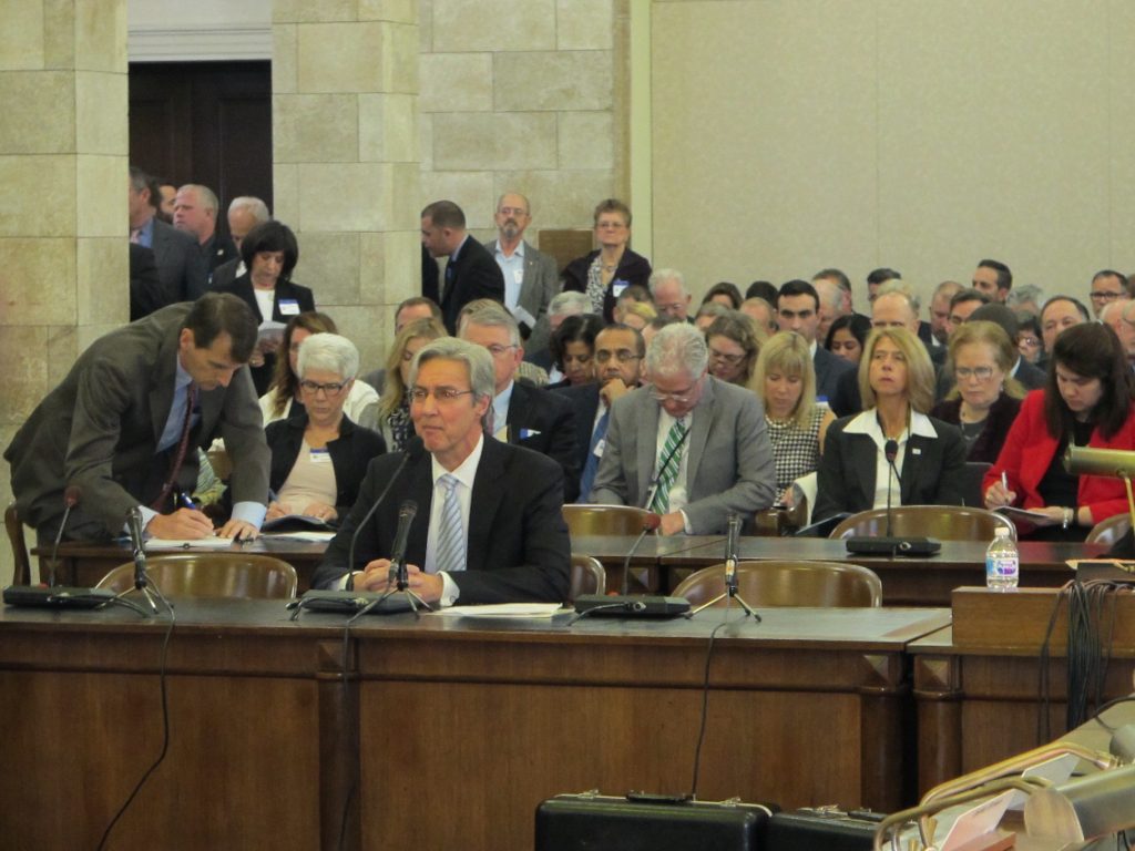Izzo Public Service Enterprise Group CEO Ralph Izzo testifies at a legislative hearing Monday.