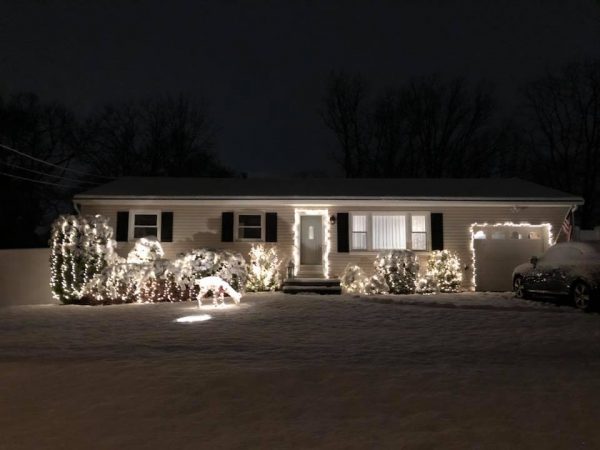 Toms River, N.J., home lit up at night. 
(Photo courtesy of Janet Mutter)