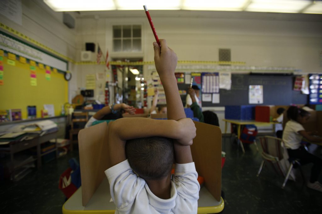 _MG_0824 A student raises his hand at Isaac Sheppard School in Philadelphia, Pennsylvania