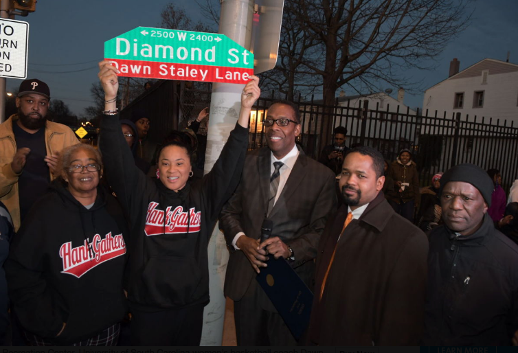Screen Shot 2017-12-26 at 3.48.36 PM Cheryl Hardy, of the Hank Gathers Recreation Center, University of South Carolina women’s basketball coach Dawn Staley, City Council President Darrell L. Clarke and state Sen. Sharif Street celebrate the newly named Dawn Staley Lane. (TRIBUNE PHOTO BY ADBUL R. SULAYMAN/TRIBUNE CHIEF PHOTOGRAPHER)