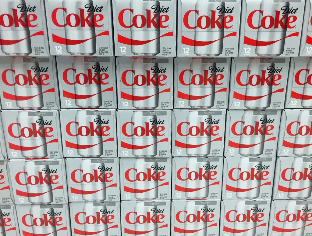 bigstock–122734487 Cases of Diet Coke on display on a grocery store shelf