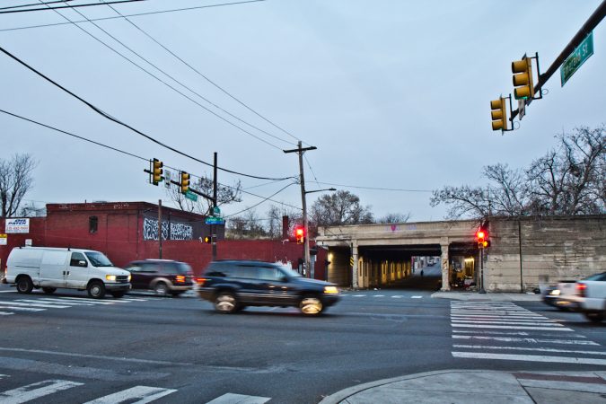 People living under the overpass at Emerald and Lehigh Streets in Philadelphia are removed weekly, but return after city workers complete the clean-up.