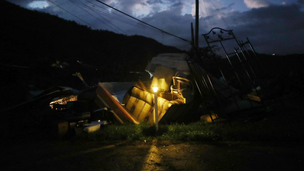 A donated solar lamp in a driveway illuminates storm debris still waiting to be collected earlier this week in Morovis, Puerto Rico. A donated solar lamp in a driveway illuminates storm debris still waiting to be collected earlier this week in Morovis, Puerto Rico. (Mario Tama/Getty Images)