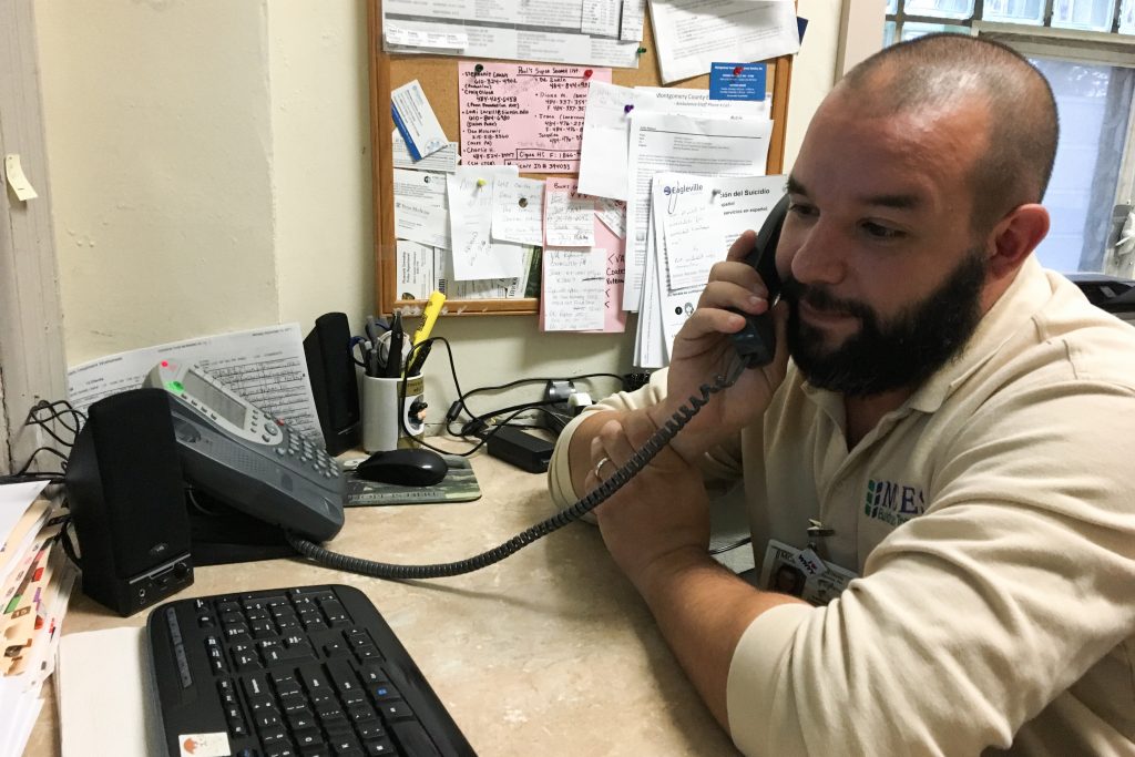 hotline Paul Butler works at the 24-hour hotline at the main psychiatric hospital in Montgomery County, Pennsylvania. (Elana Gordon/WHYY)