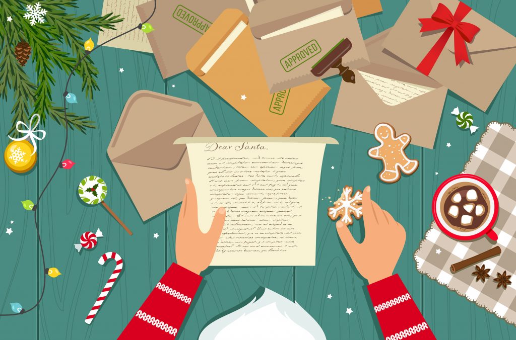 Santa Claus reading his mail. High angle view. (askmenow/Getty Images)