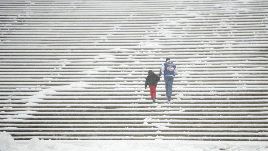 2017 03 14-j wilson-philadelphia rocky steps-snow and sleet Snow and sleet did not deter two members of the Huerta family, visiting from Houston, from challenging the Rocky Steps. Philadelphia is preparing for up to 3 inches of snow beginning Thursday morning.