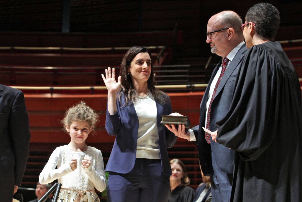 2018 01 02-e lee-julia bright rebecca rhynhart dave mcduff judge carolyn nichols-philadelphia kimmel center verizon hall-inauguration Julia Bright (left) celebrates while her mother, Rebecca Rhynhart (center), is sworn in as Philadelphia city controller.