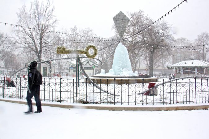 The fountain at Franklin Square Park in Philadelphia forms an abstract ice sculpture as water continues to bubble up into the freezing air.