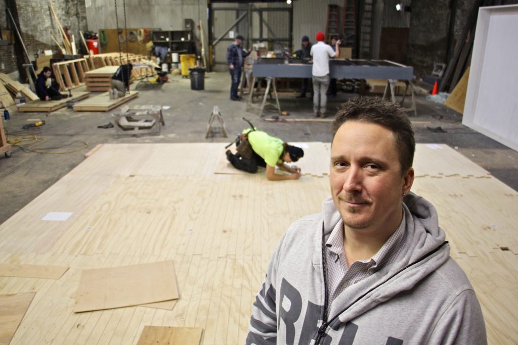 2018 01 12-e lee-matthew lewandowski-philadelphia-scenic works theater set Matthew Lewandowski stands in the Philadelphia Scenic Works workshop where set builders from three different small theater groups find space to work at the same time.