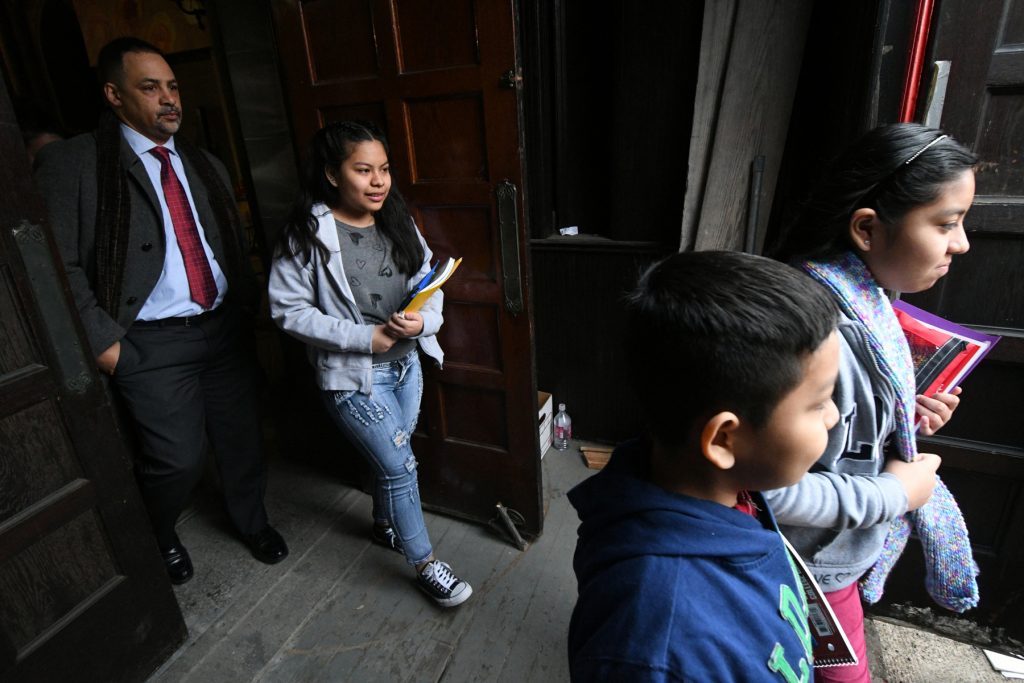 2018 01 29-b slabbers-philadelphia church of the advocate-daca sanctuary undocumented back to school BS1390_006_BAS_3426 The four undocumented children of Camela Apolonio Hernandez step out of their sanctuary at Church of the Advocate in North Philadelphia, heading back to school for the first time since the family received a deportation order.