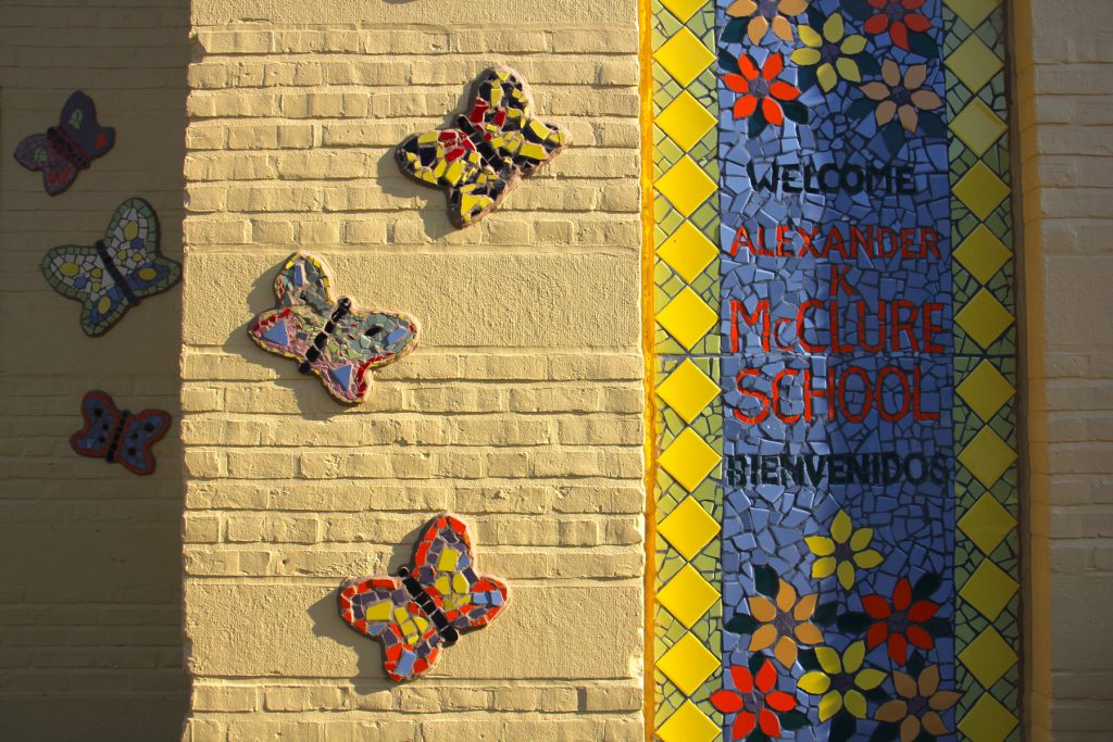 2018 10 09-e lee-philadelphia mcclure school-mosaic murals 3×2 A five-year mural project covers the facade of the McClure School in North Philadelphia with colorful mosaics designed by students.
