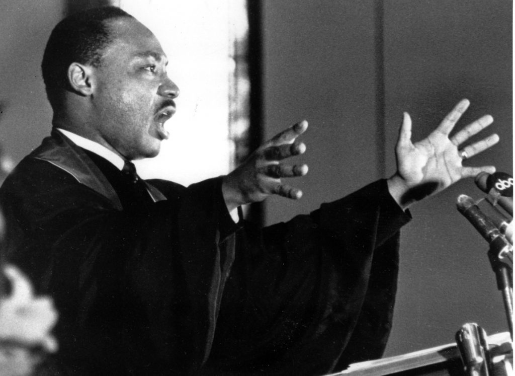 MARTIN LUTHER KING JR. The Rev. Dr. Martin Luther King Jr. gestures and shouts to his congregation in Ebenezer Baptist Church in Atlanta, Ga. on April 30, 1967 as he urges America to repent and abandon what he called its