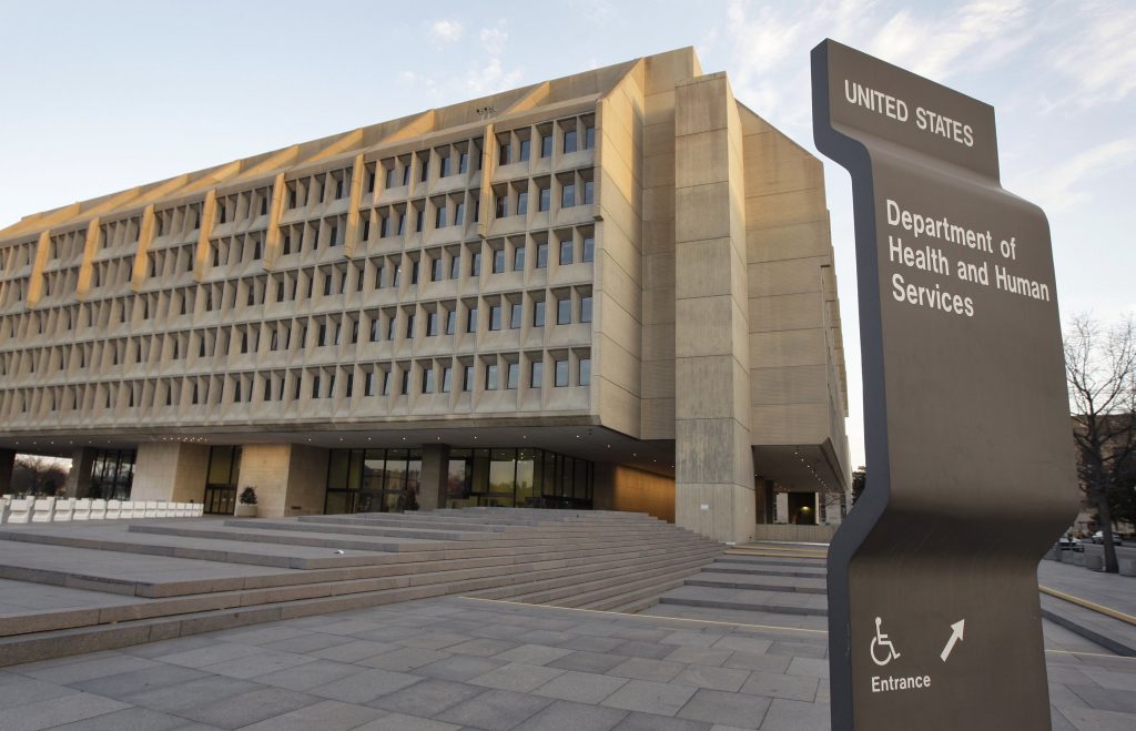 HHS The Department of Health and Human Services building is seen in the evening in Washington
