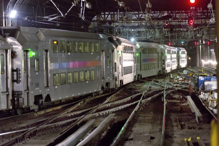In this Tuesday, July 25, 2017 photo, a New Jersey Transit train traverses the tracks in New York's Penn Station.