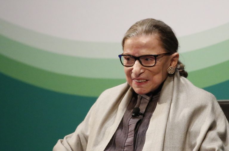 FILE - In this Sept. 11, 2017 file photo, U.S. Supreme Court Justice Ruth Bader Ginsburg smiles as she converses with Judge Ann Claire Williams of the U.S. Court of Appeals for the Seventh Circuit at Roosevelt University, in Chicago.