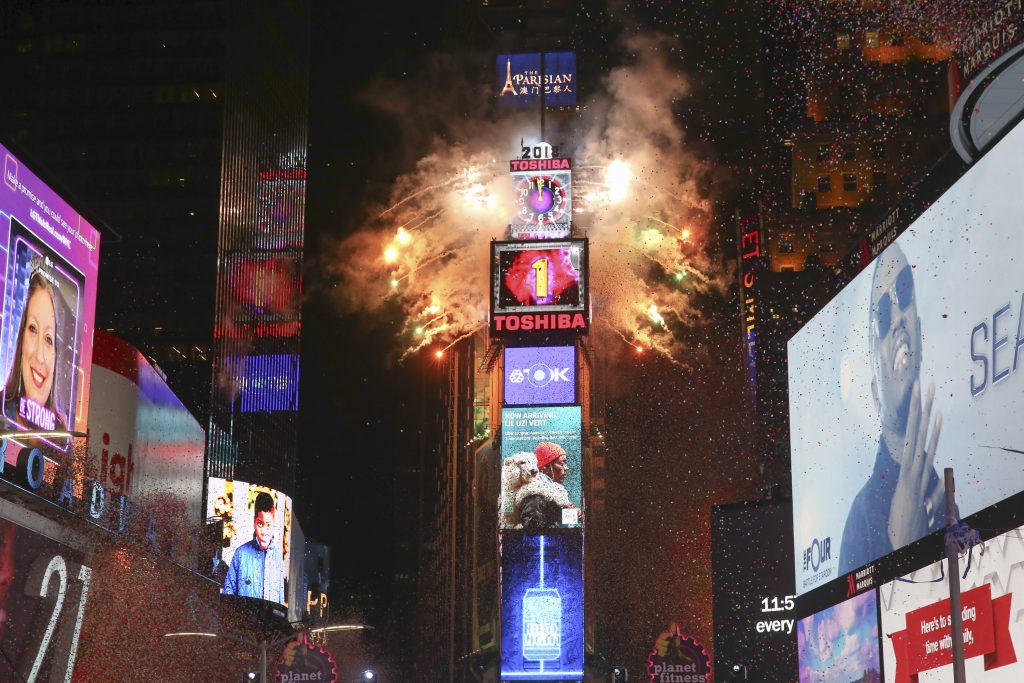 The ball drops during the New Year's Eve celebration in Times Square on Sunday, Dec. 31, 2017, in New York.