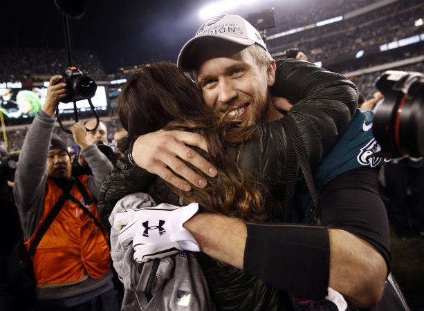 Philadelphia Eagles' Nick Foles gets a hug after the NFL football NFC championship game against the Minnesota Vikings Sunday, Jan. 21, 2018, in Philadelphia. The Eagles won 38-7 to advance to Super Bowl LII. (AP Photo/Patrick Semansky)