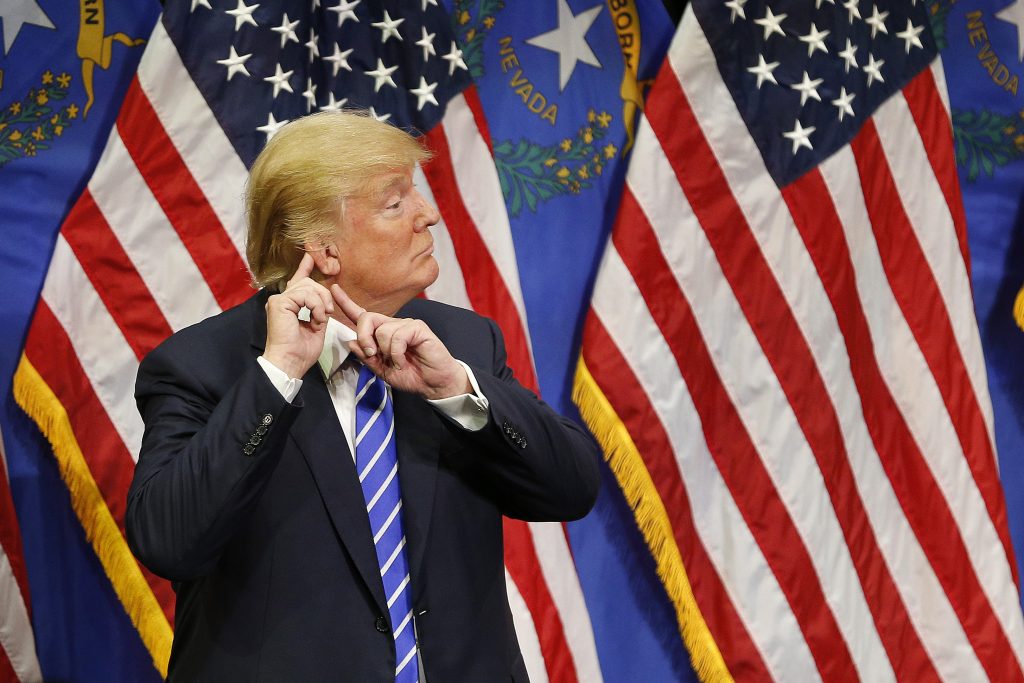 Donald Trump FILE -- In this Oct. 8, 2015 file photo, Republican presidential candidate Donald Trump reacts after speaking at a rally , in Las Vegas.