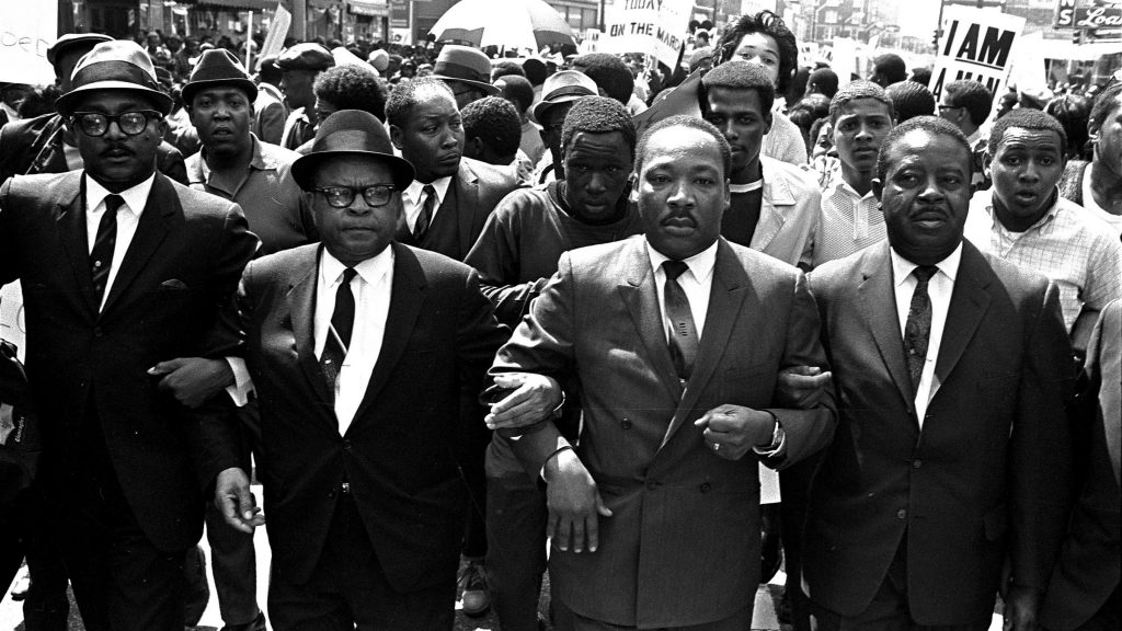 CIVIL RIGHTS LEADERS MARCH The Rev. Ralph Abernathy, right, and Bishop Julian Smith, left, flank Dr. Martin Luther King, Jr., during a civil rights march