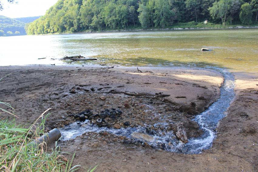 Duke-study Treated oil and gas wastewater flows into a western Pennsylvania stream. (Avner Vengosh/Duke)