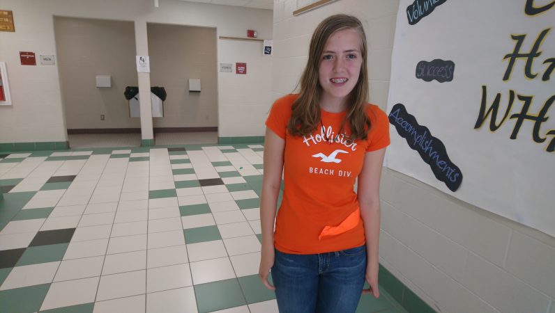 Titusville High School freshman Abigail Bryan lives on a nearby farm (Kevin McCorry/WHYY)