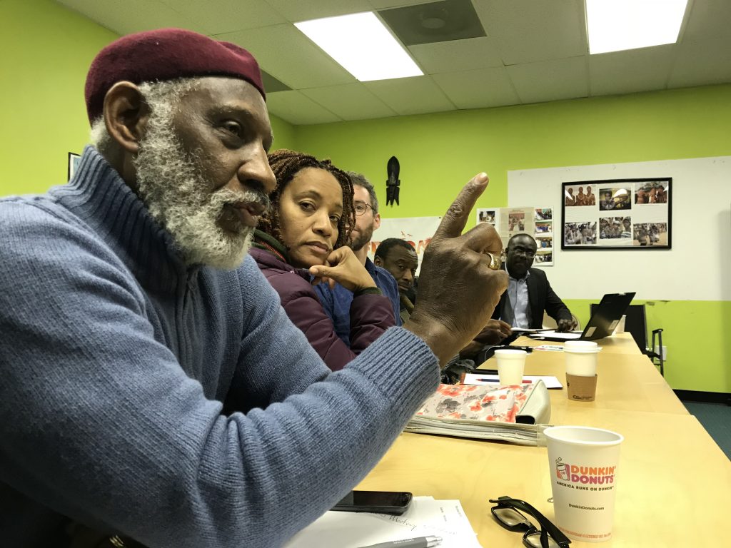 IMG_1041 Stanley Straughter, a member of the Mayor's Commission on African and Caribbean Immigrant Affairs, speaks during a strategizing meeting of African and Caribbean community members on January 13, 2018 at Southwest Community Development Corporation in Philadelphia. (Laura Benshoff/WHYY)
