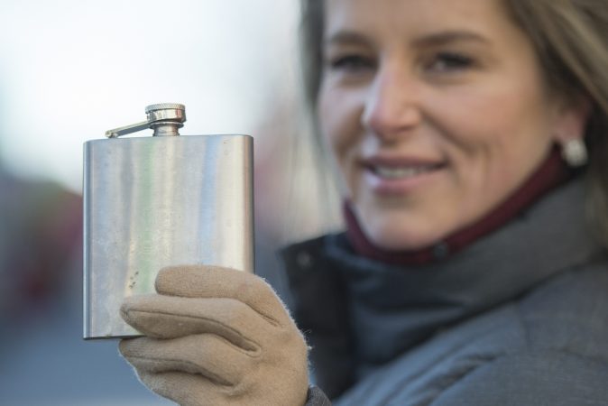 Carol Custar braves the record low temperatures with her flask of rum.