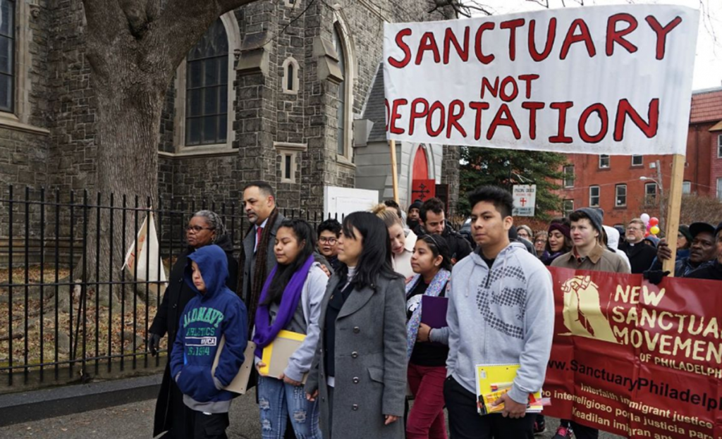 Protesters march outside the Church of the Advocate in North Philadelphia (Abdul R. Sulayman/The Philadelphia Tribune)