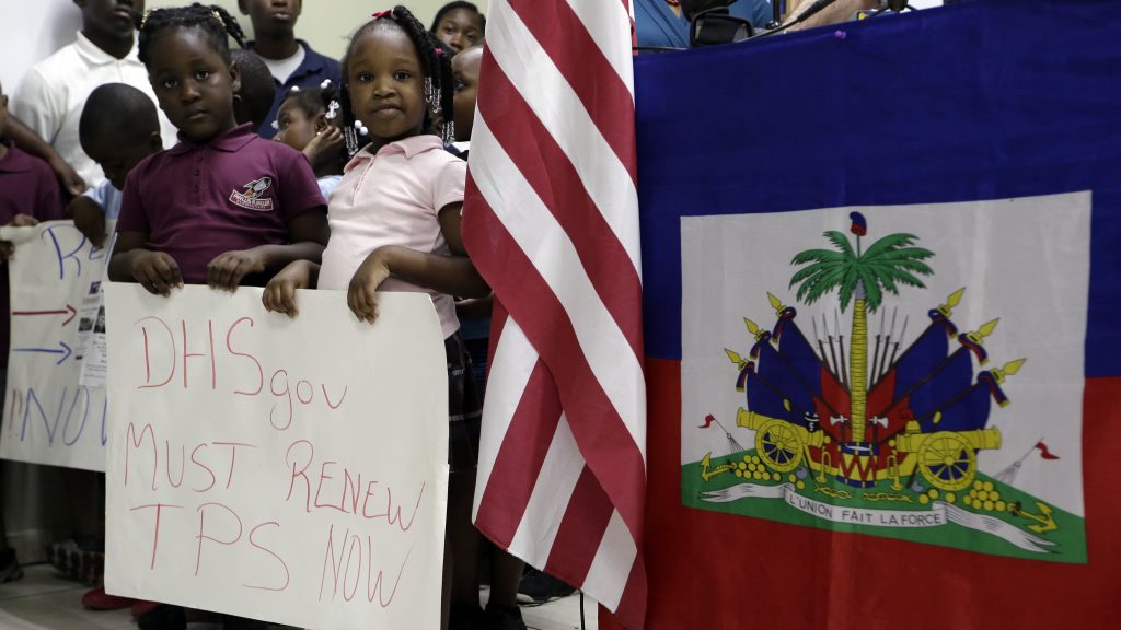 Children hold signs at a November news conference in Miami in support of renewing temporary protected status for immigrants from Central America and Haiti. Children hold signs at a November news conference in Miami in support of renewing temporary protected status for immigrants from Central America and Haiti. (Lynne Sladky/AP)