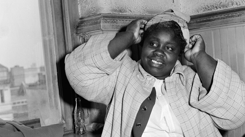 Georgia Gilmore adjusts her hat for photographers in 1956 during the bus boycott trial of Rev. Martin Luther King Jr. in Montgomery, Ala. She testified: “When you pay your fare and they count the money, they don’t know the Negro money from white money.” Georgia Gilmore adjusts her hat for photographers in 1956 during the bus boycott trial of Rev. Martin Luther King Jr. in Montgomery, Ala. She testified: