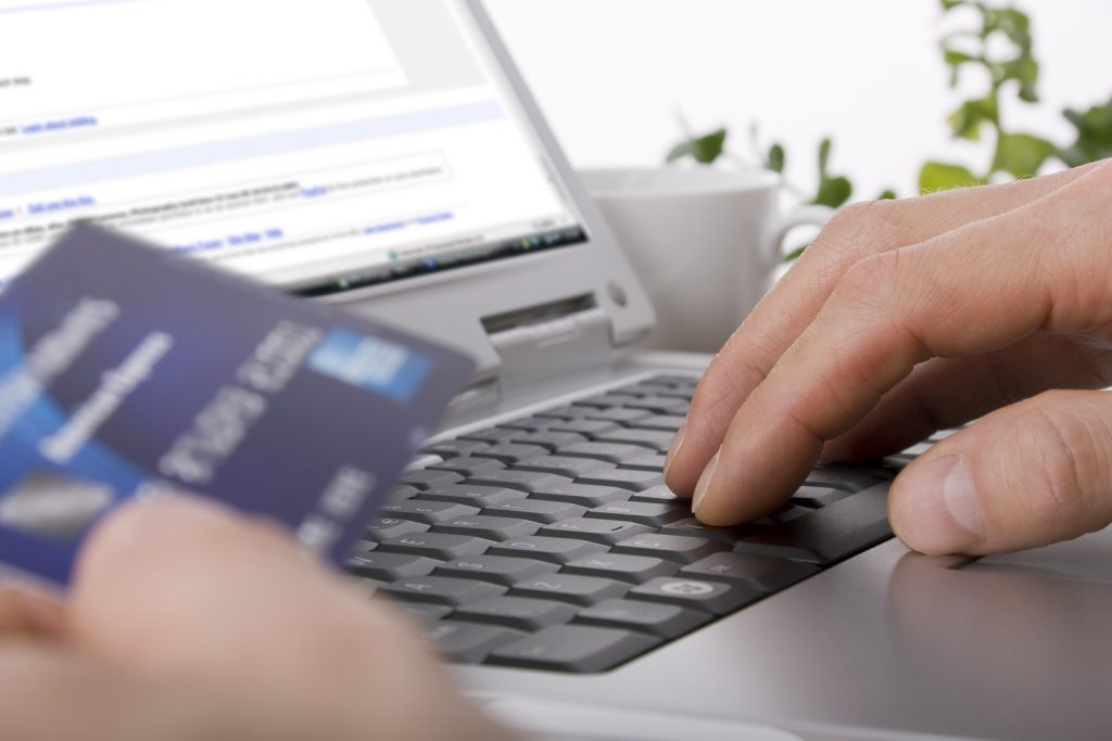 Online Shopping Online shopping using a credit card to complete an e-commerce transaction
